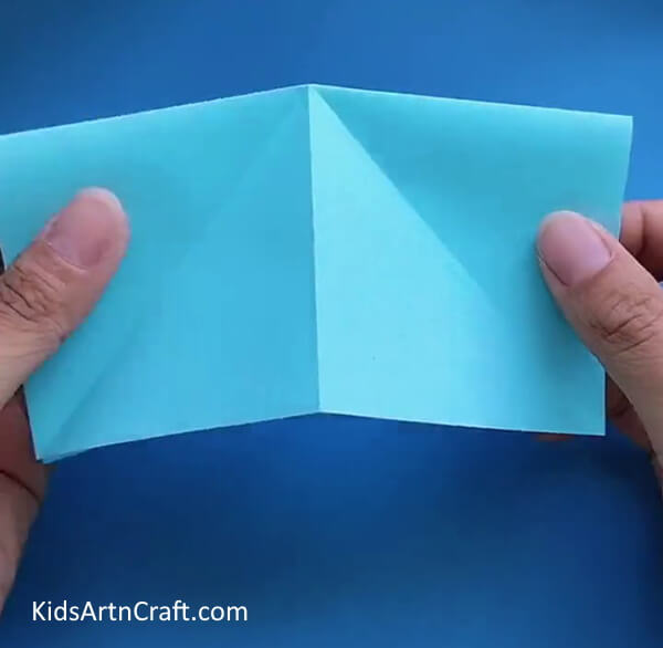 Connect Two Corners- Creating a Paper Airplane with Origami for Youngsters