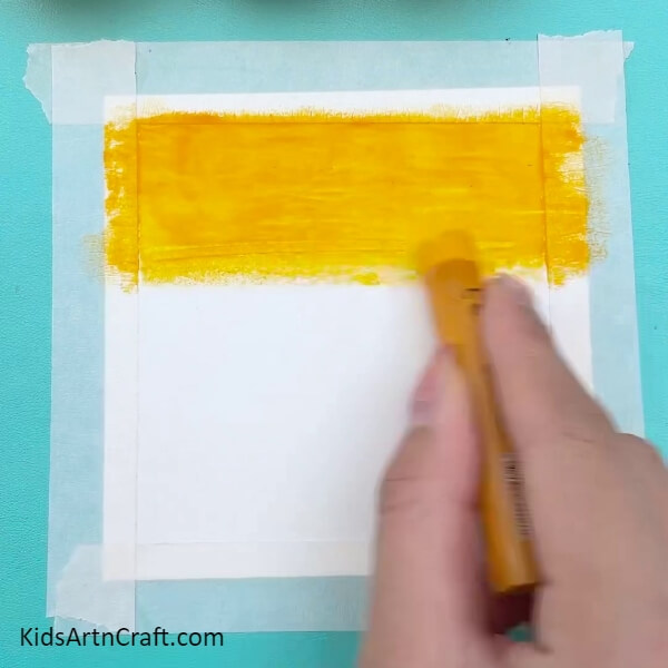 Paint the sky yellow for the dusky effect- How to Paint a Dusk Scene Quickly and Easily for Kids