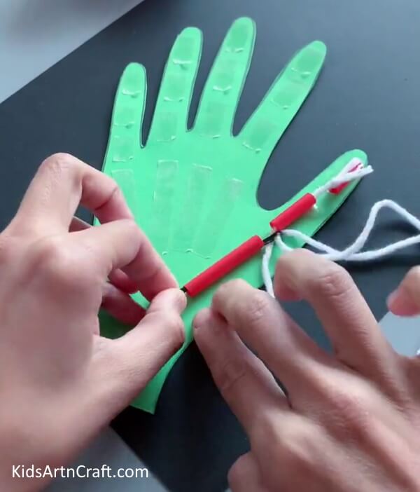 Pasting The Straw Pieces - Create a Robotic Hand Using Paper
