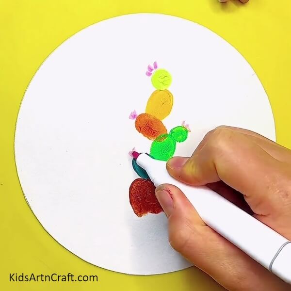 Using The Purple Sketch Pen-Fingerprint Cactus Drawing Idea For Kindergartners